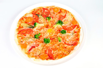 Wall Mural - Delicious pizza with broccoli, tomatoes and vegetables on plate