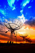© pdm - The silhouette of a radio telescope observatory