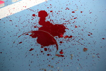 Red Blood On The Floor From Which The Spray Flew Off