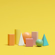colorful geometric shapes set on yellow background. minimal concept idea