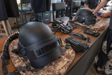 Full Cover Helmet As Online Game's Item On The Camouflage Style Bag 