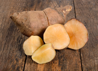 Yacon roots on wooden background