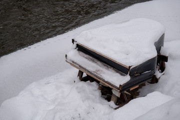 Canvas Print - Abandoned piano covered by snow