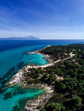 Fototapeta Londyn - Kavourotrypes or Orange is a small paradise of small beaches located between Armenistis and Platanitsi in Sithonia, Chalkidiki, Greece