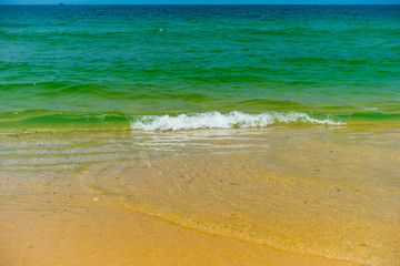 Tropical beach with turquoise water and white sand