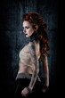 © Warpedgalerie - Young tattooed woman, profile