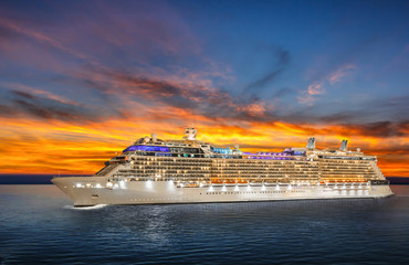 Wall Mural - Luxury cruise ship sailing to port on sunset. 