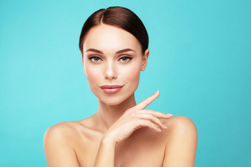 Wall Mural - Elegant model with brown hair and  Clean Fresh perfect Skin Skin care,Beauty treatment and spa concept.