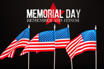 Wall Mural - american flags with memorial day lettering isolated on black