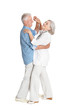 © aletia2011 - Portrait of happy senior couple dancing on white background