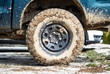 Muddy dirty offroad terrain vehicle overland wheel