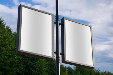 Wall Mural - 3d rendering of blank billboard (empty advertisement) with clouds. empty mockup template