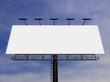 © pabijan - 3D rendering of blank billboard (empty advertisement) with clouds. Empty mockup template