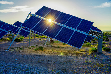 Tilted solar photovoltaic panels under sunlight