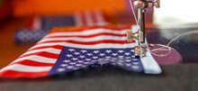 Sewing Small American Flags. Preparation For Celebrating 