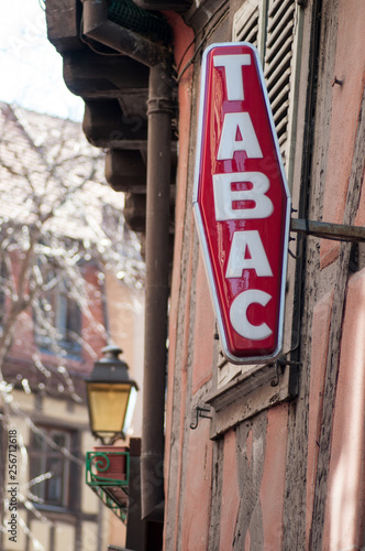 Cuadros en Lienzo closeup of red tabacco sign with french text tabac, the traduction in english of
