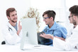 © ASDF - group of doctors at a working meeting