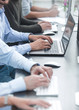 © ASDF - background image of a business team using computers