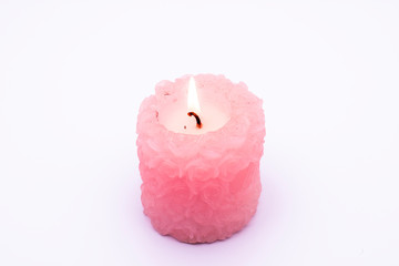 pink candle on white background. candles pink isolated on white background