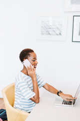 Wall Mural - casual working woman making a call