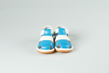 Wall Mural - White and blue shoes for kid