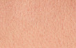 © nataba - Cosmetology textured background from pink healthy human skin of the croup fired up, covered with pores and fine wrinkles