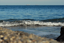 Rocky Coast Of The Sea. Waves On The Beach. Blue Sea Water.