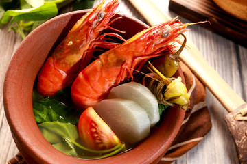 Wall Mural - Prawns in sour broth. Very delicious dish from Philippines. Sinigang na Hipon