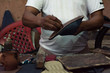 shoe maker fixing shoes