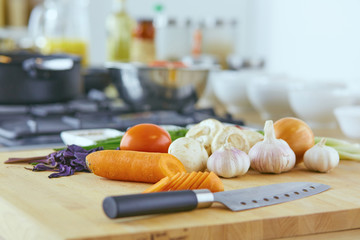 Wall Mural - Composition with wooden board and ingredients for cooking on ta