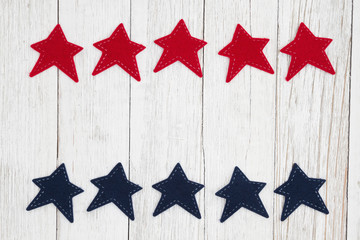 Canvas Print - Red and blue stars on weathered whitewash textured wood background