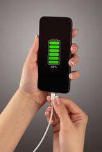 Elegant Hand Charging Cellphone With Low Battery
