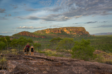 tourists walking down from the nadab lookout in ubirr, kakadu national park - australia, northern te