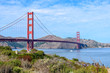 Golden Gate Bridge in Clear Blue Sky with Nature in the Foreground
