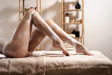 Body Wrapping In A Spa Room. Anti Cellulite Fat Burning Procedure In Massage Salon For Perfect Slim Body And Clear Skin