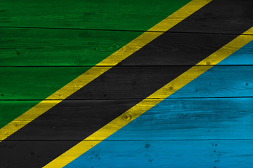 Wall Mural - Tanzania flag painted on old wood plank