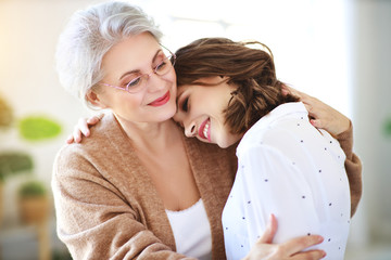 Wall Mural - family two generations old mother and adult daughter.