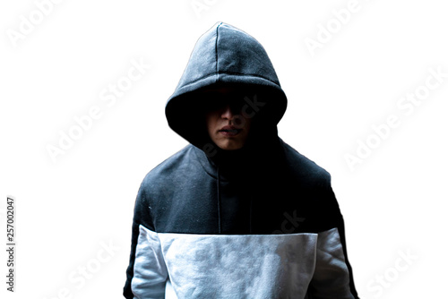 Fotografía anonymous man in the dark hood standing in the mysterious pose f