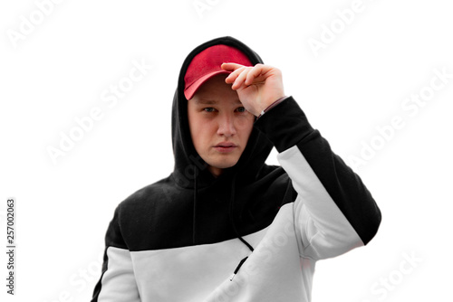 Cuadros en Lienzo stylish man in the hood in urban city, modern fashion clothes concept f