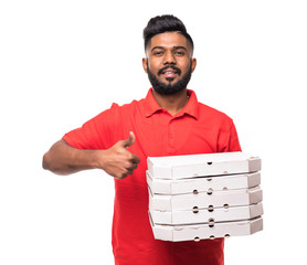 Wall Mural - Pizza delivery concept. Young handsome delivery man showing pizza box and holding thumb up sign isolated on white background