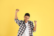 © New Africa - Portrait of emotional African-American teenage boy on color background