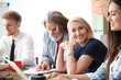 © New Africa - Business people discussing work matters in office. Professional communication