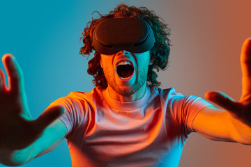 Man in VR glasses screaming at camera