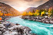 Katun river in autumn mountains at sunset. Altai, Siberia, Russia