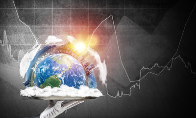 Wall Mural - Hand of waitress presenting Earth globe on tray.