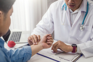 Wall Mural - Doctor checking health primary of male patient for consultation health in hospital health. health and doctor concept.