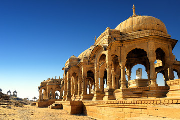 Fototapete - Ancient royal cenotaphs and archaeological ruins at Jaisalmer Bada Bagh Rajasthan, India
