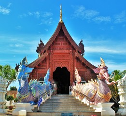 beautiful of two Naga in front of the church at Banden temple, Chiang Mai, Thailand. Naga sculpture in front of the Thai temple and sky background. Thai modern culture.