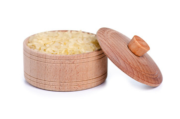 Wall Mural - Rice in wooden bowl with lid on white background isolation