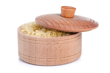 Wall Mural - Rice in wooden bowl with lid on white background isolation